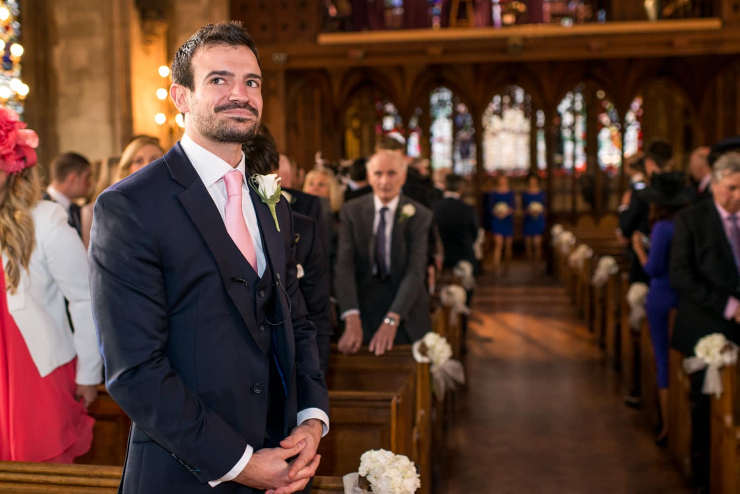 groom waiting at the alter of St Etheldredas church