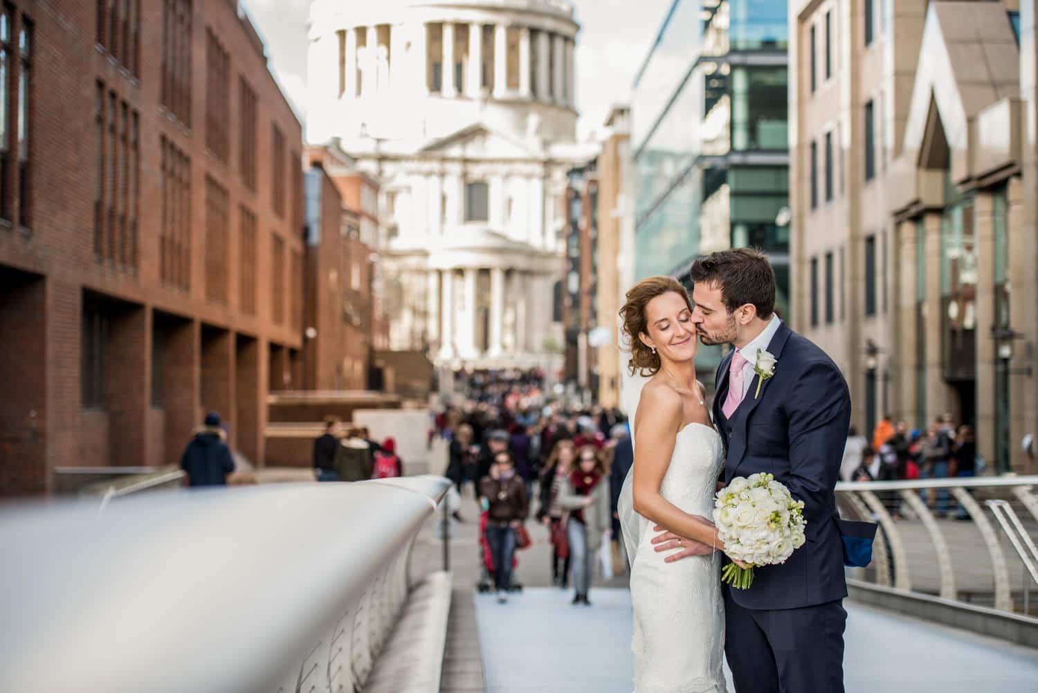 bride and groom portraits in front of St Pauls cathedral