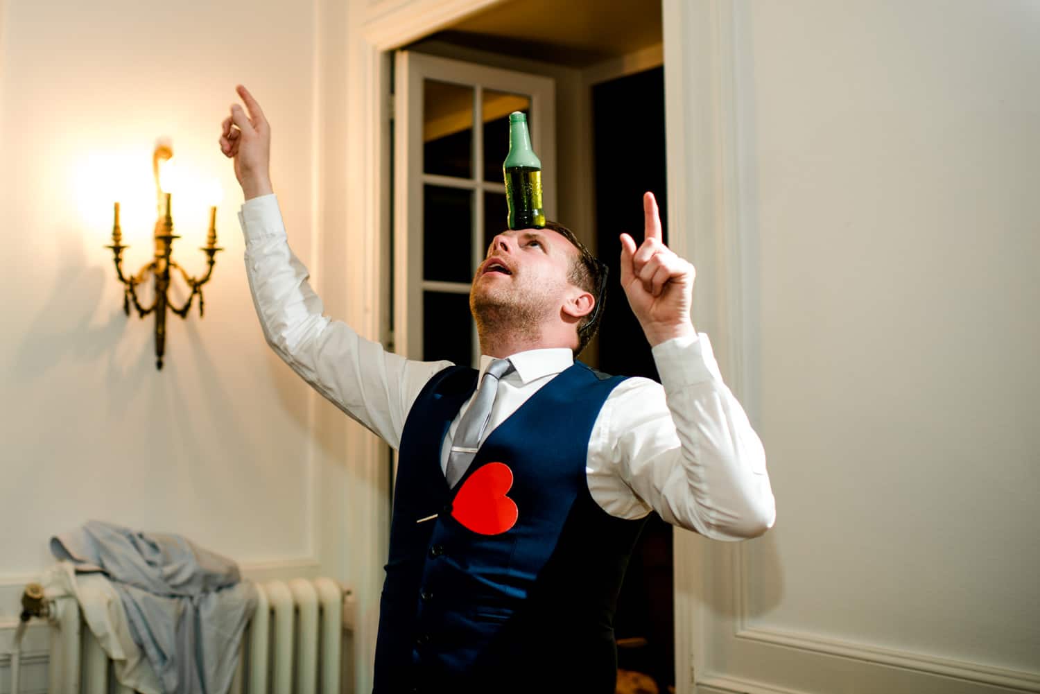 wedding guest balancing beer on head