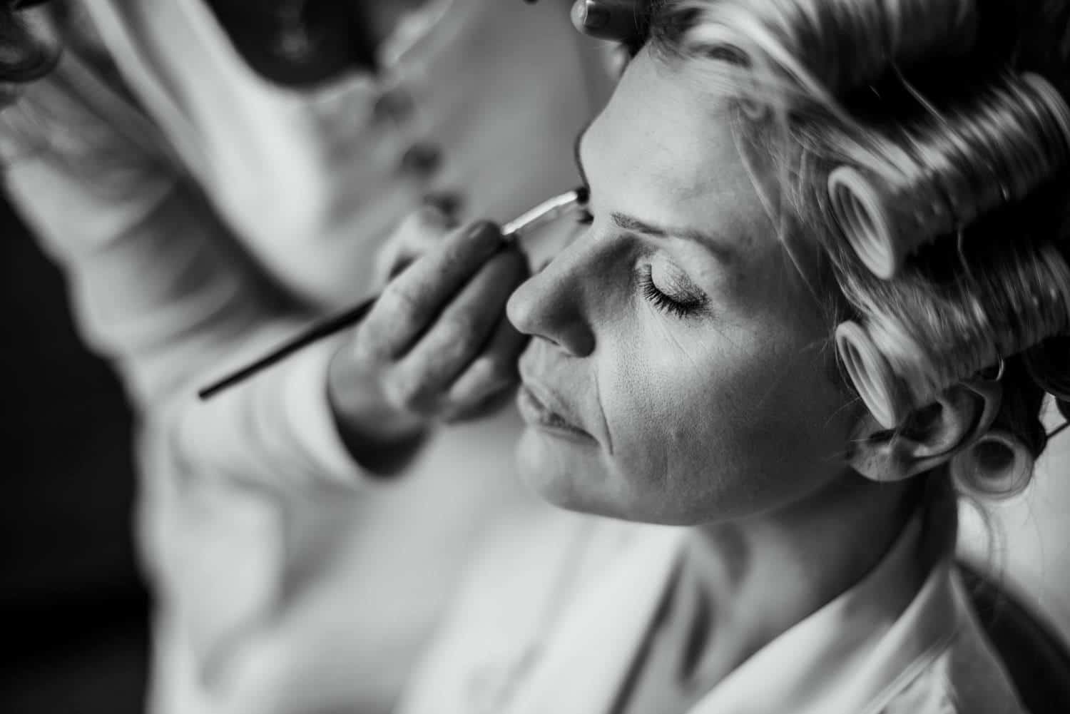 eyeshadow being applied to bride