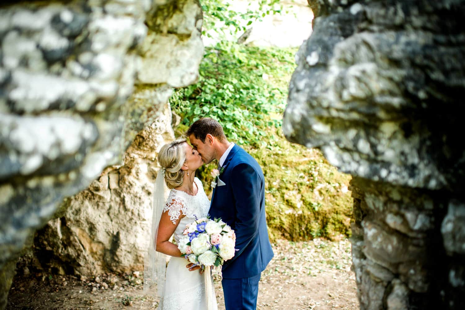 rockface at wedding ceremony in the chapel of Chateau de Lacoste wedding venue