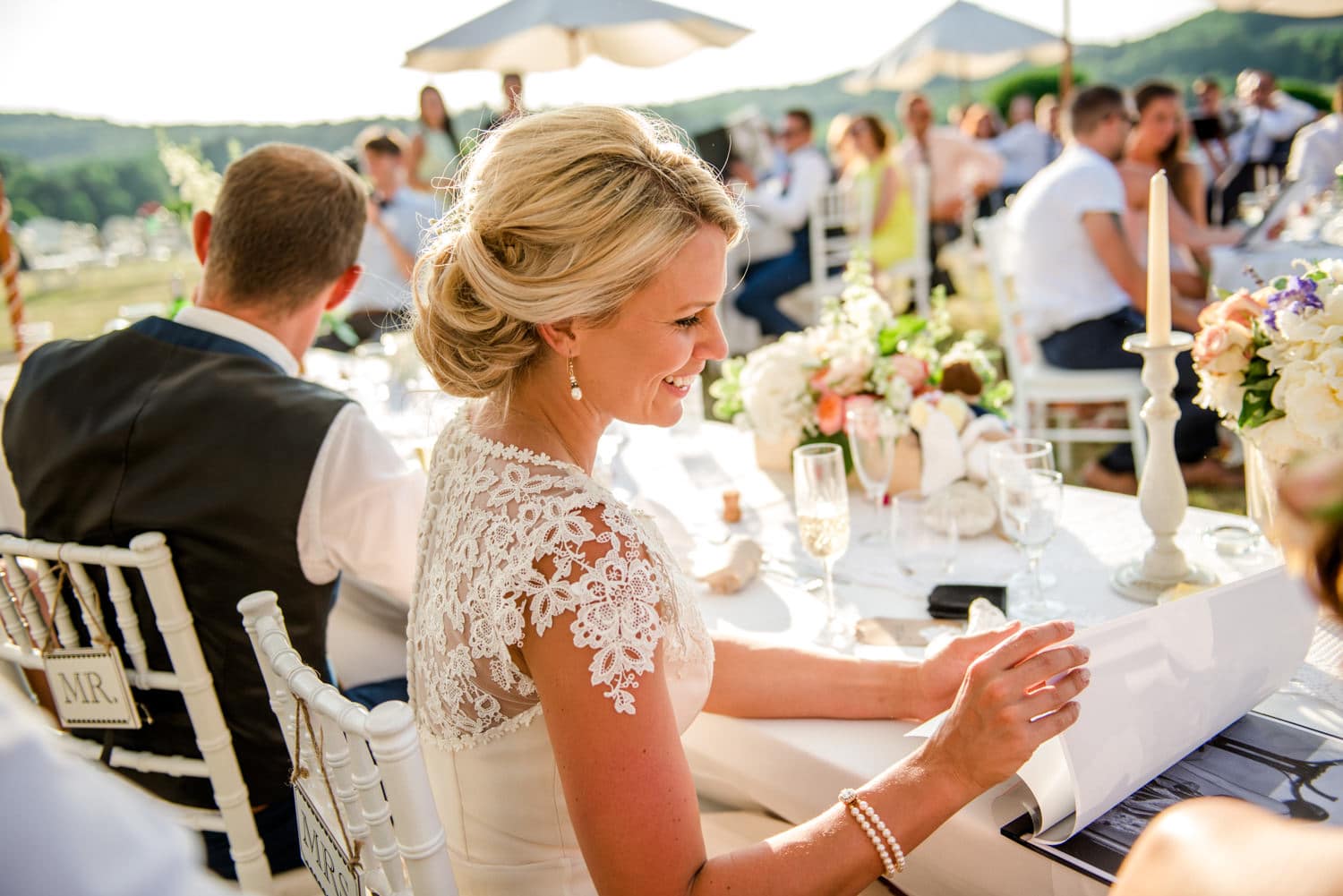 bride during wedding breakfast at Chateau de Lacoste wedding venue