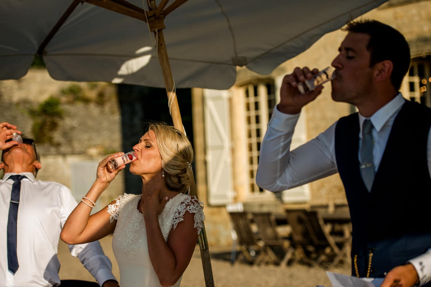 downing shots at wedding speeches at Chateau de Lacoste wedding