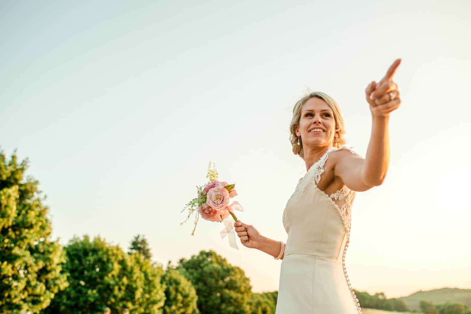 bride about to throw wedding bouquet