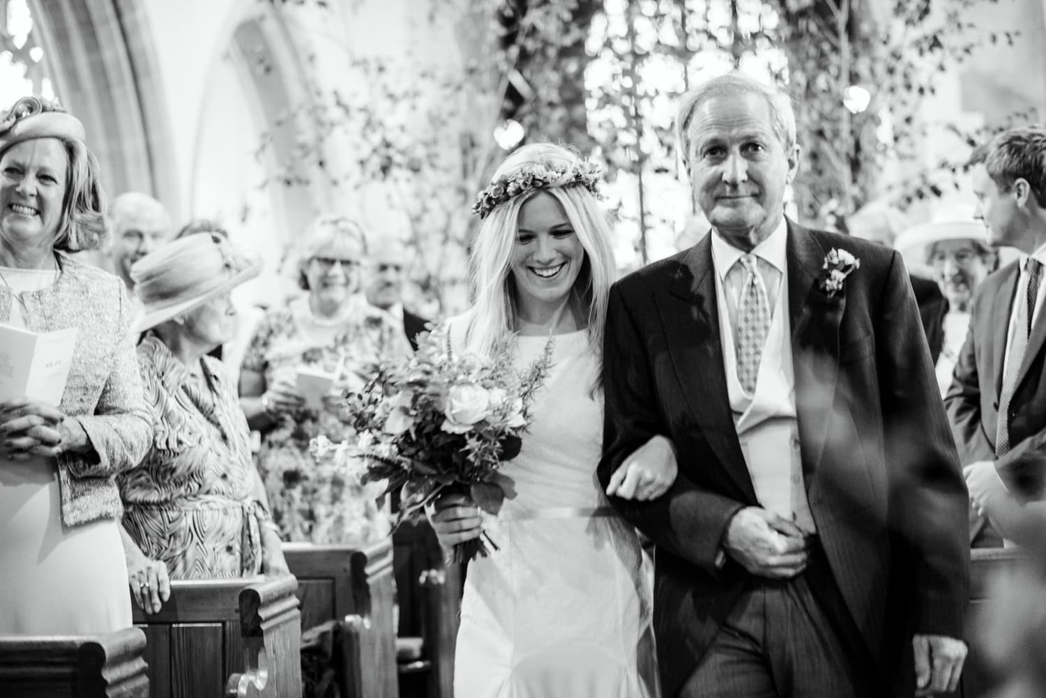 bride with her father walking down the aisle