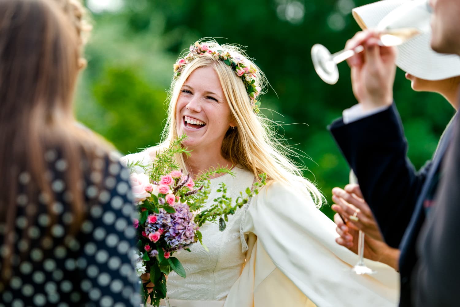 bride laughing at wedding