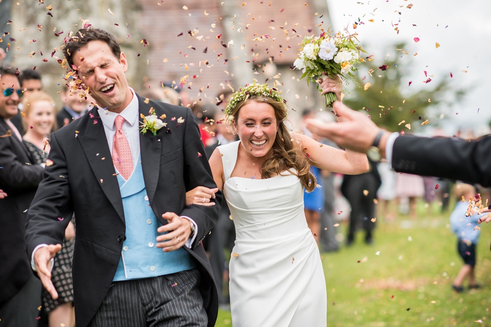 Confetti thrown at grooms face