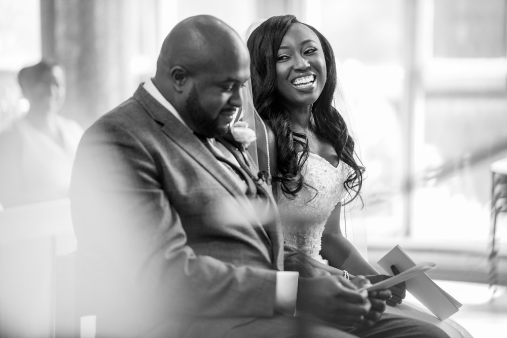 bride and groom at alter