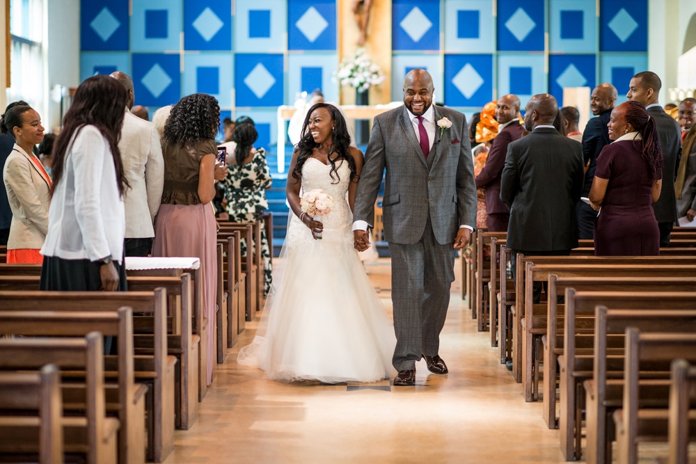 Bride and groom walking down aisle