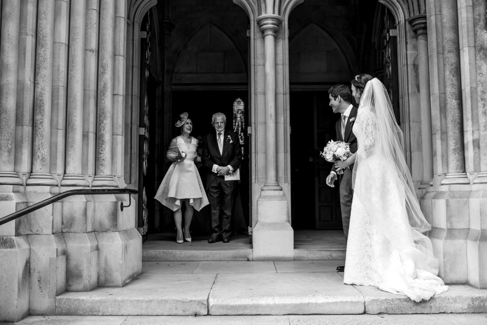 bride and groom outside St James church London