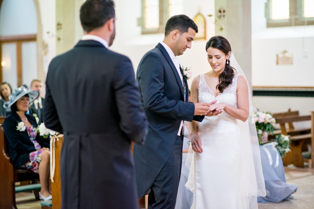 exchanging rings at St Francis of Assisi church