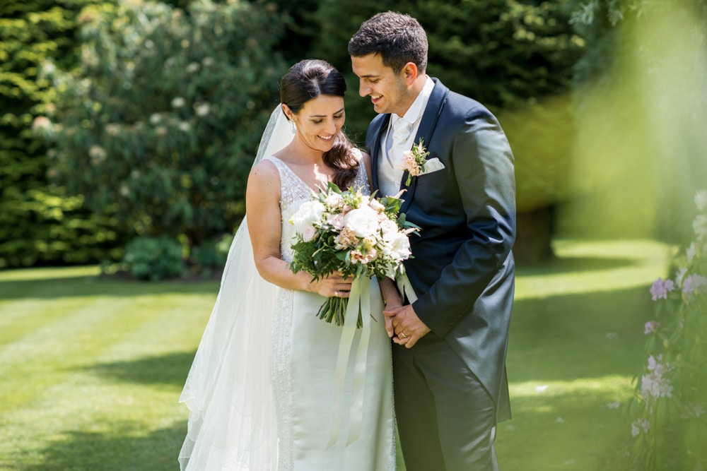 bride and groom portrait in beautiful garden