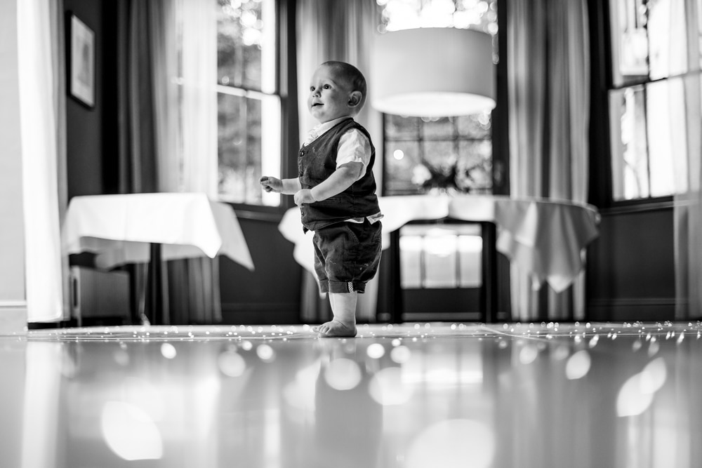 pageboy on dancefloor at bluebells restaurant wedding