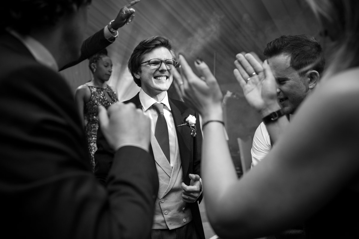 Groom on dancefloor