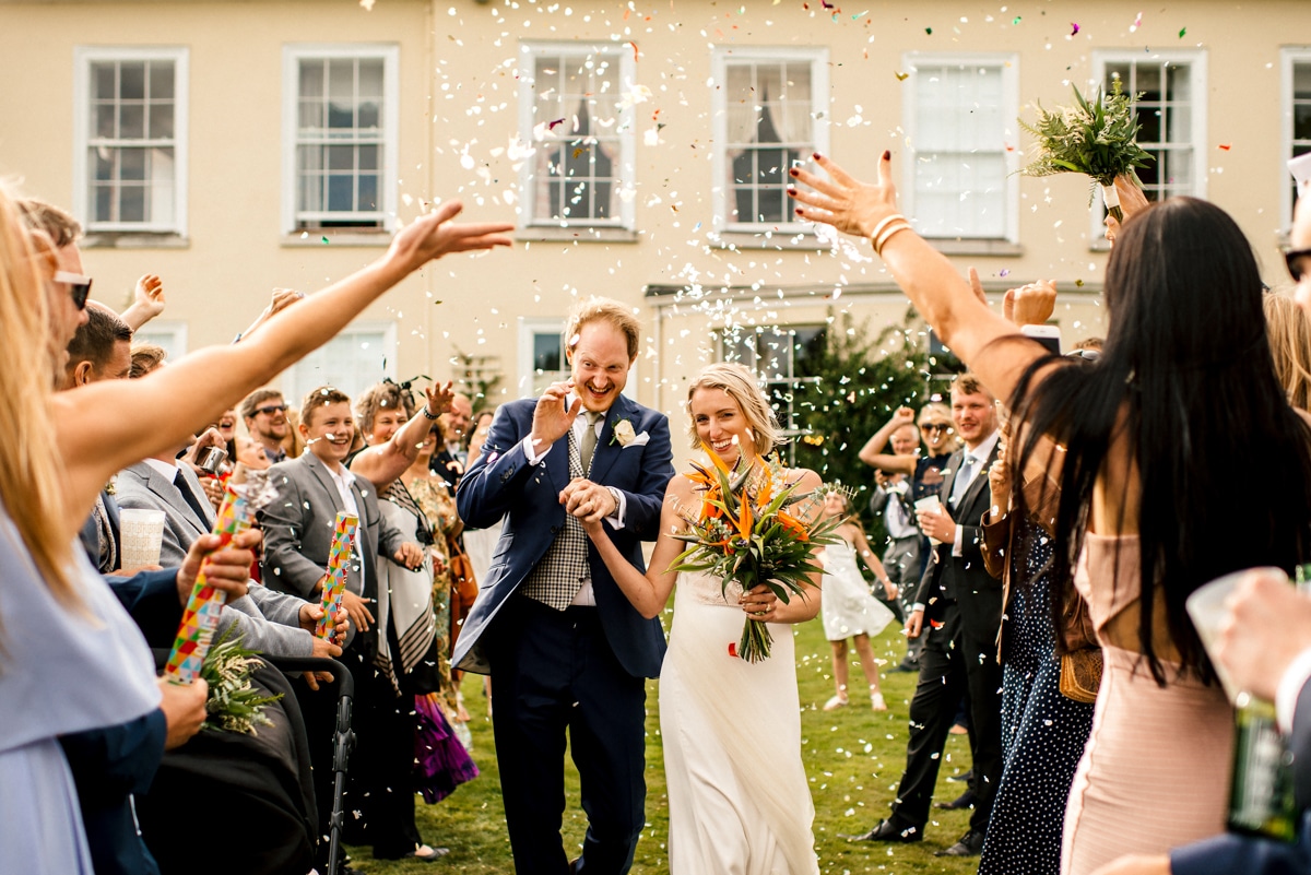 confetti moment with bride and groom