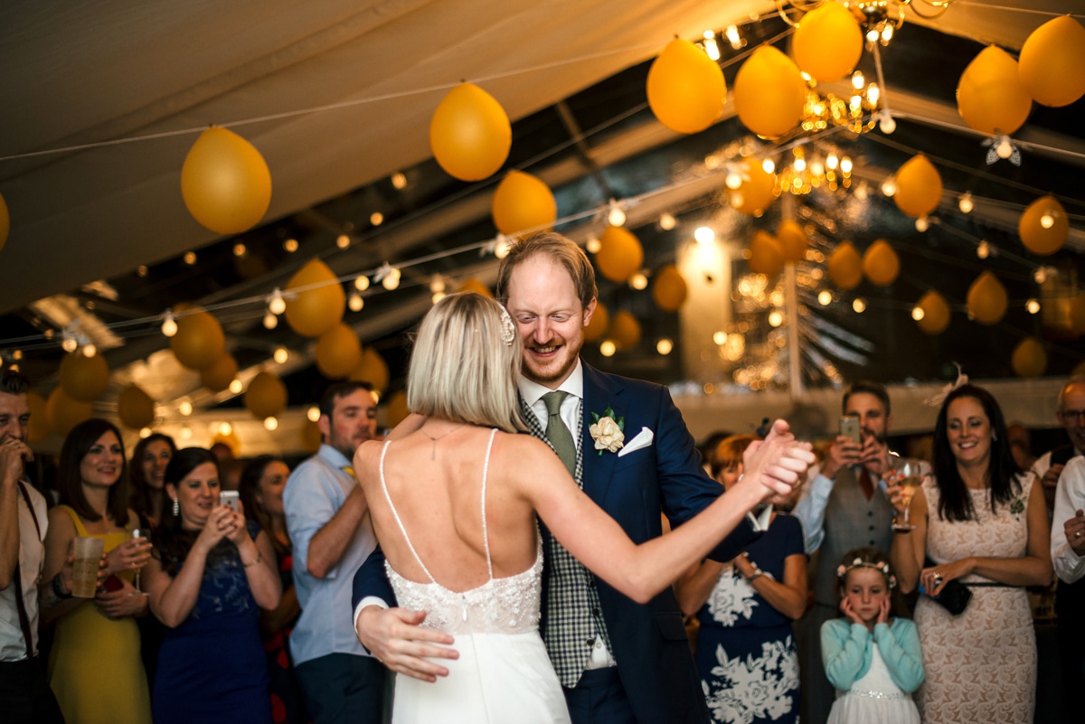 wedding marquee with yellow balloons