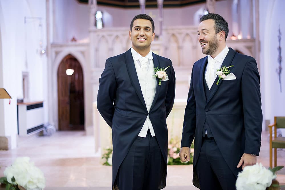 Groom and bestman waiting at the church