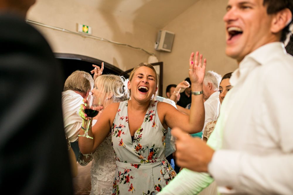 guests singing and partying at wedding