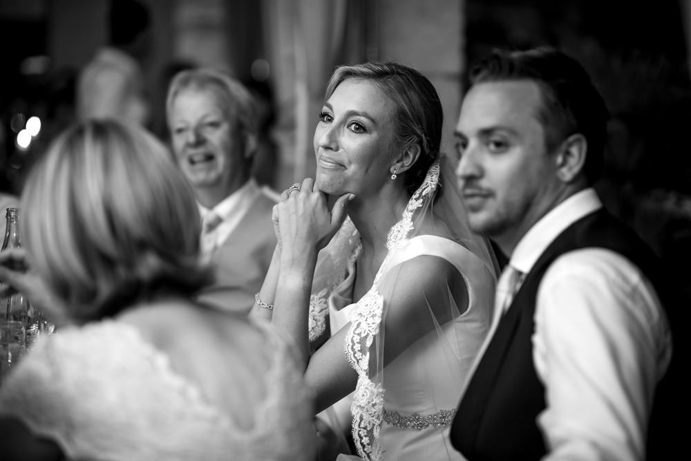 bride laughing during speeches