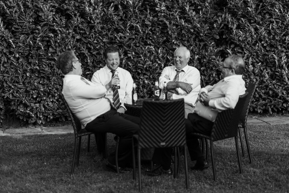 wedding guests enjoying beer