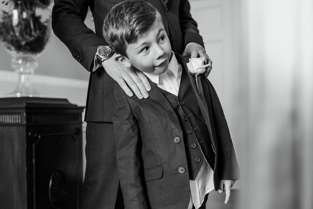 pageboy looking down the aisle