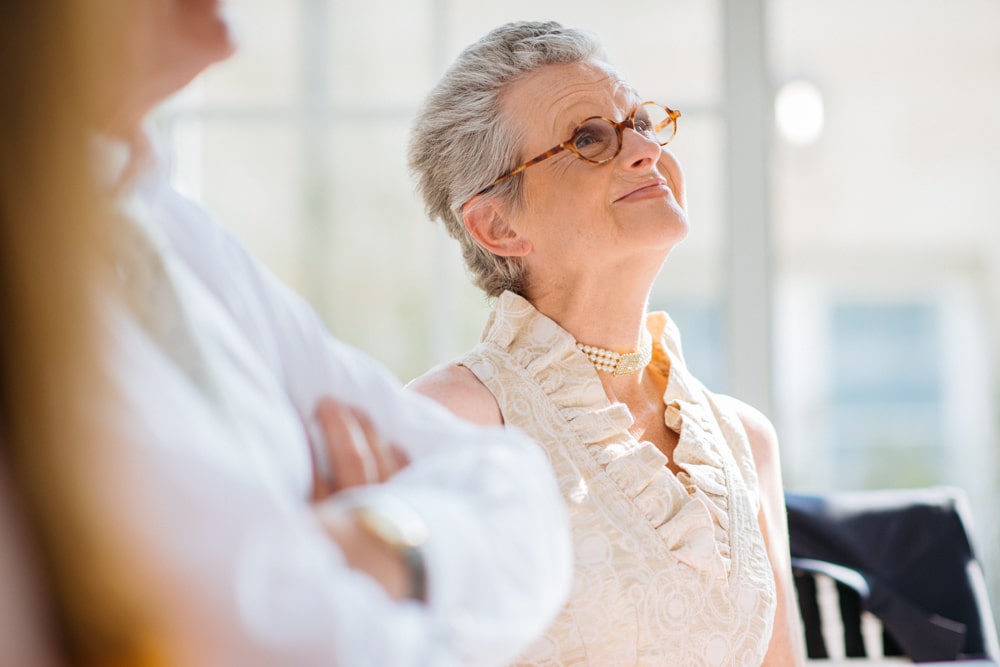 mother of the groom enjoying the speeches