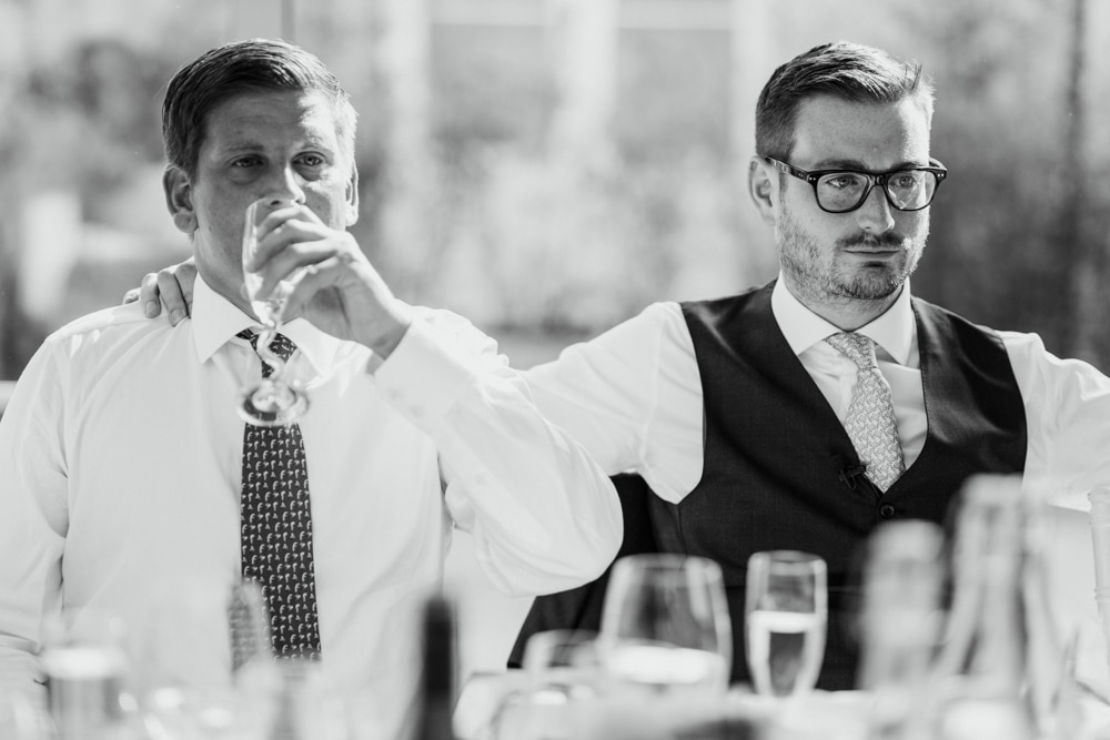 emotional moment between best man and groom