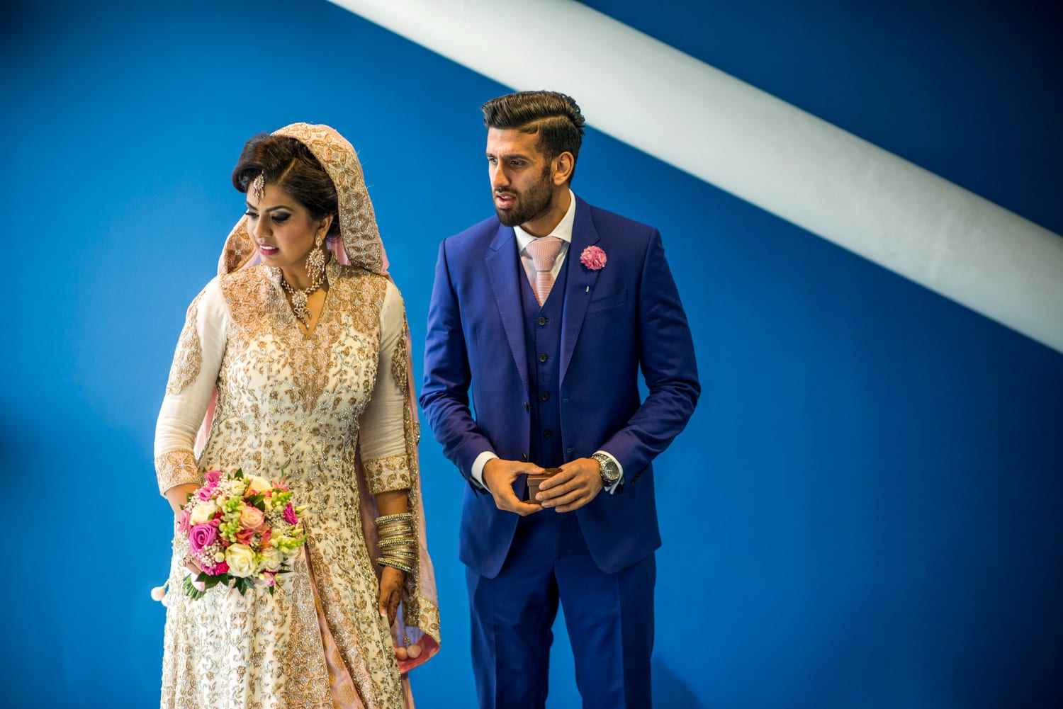 bride and groom waiting for their guests at Newbury Racecourse Walima