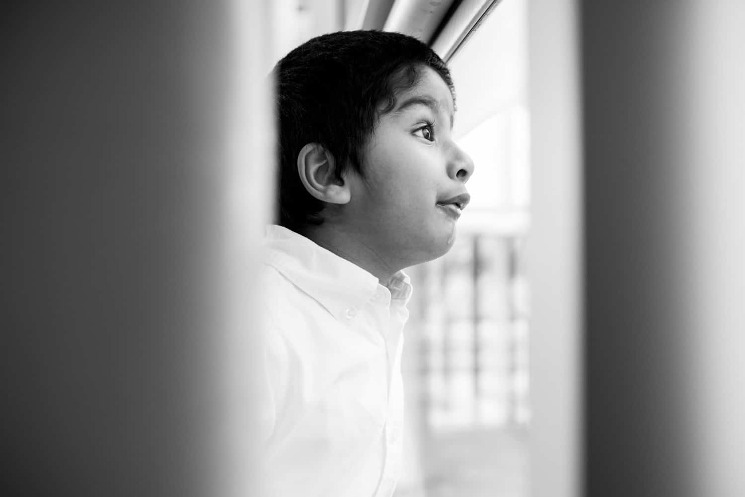 child looking out window at Newbury Racecourse Walima