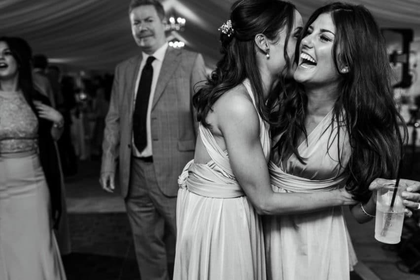 laughter on dancefloor of wedding