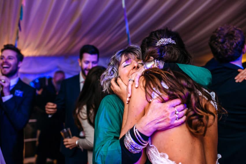 bride hugging mum