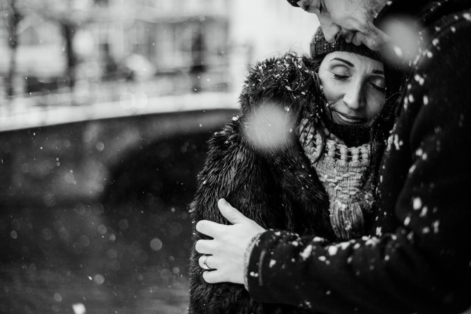 couple embracing in snow