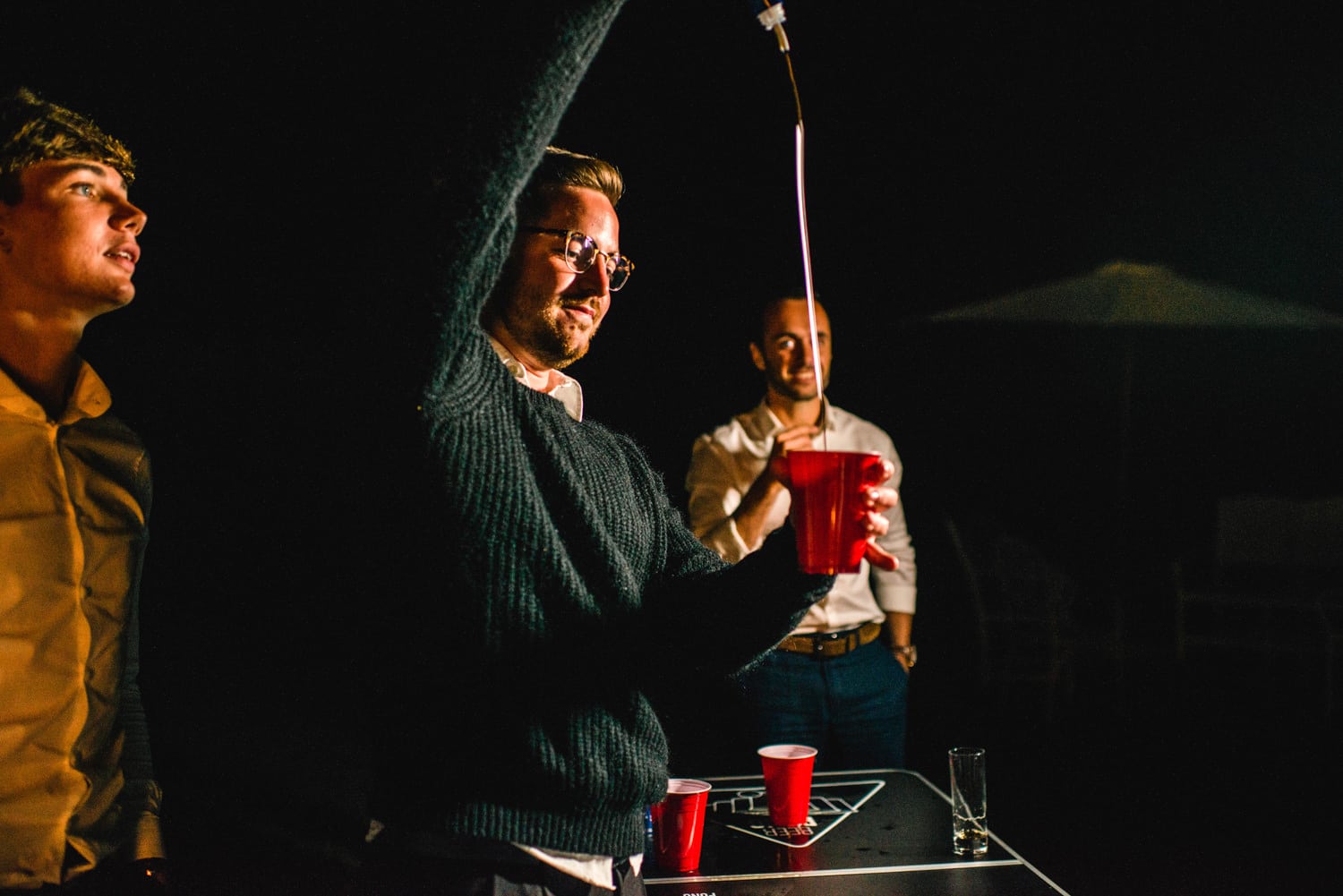 beer pong at wedding at chateau de lacoste