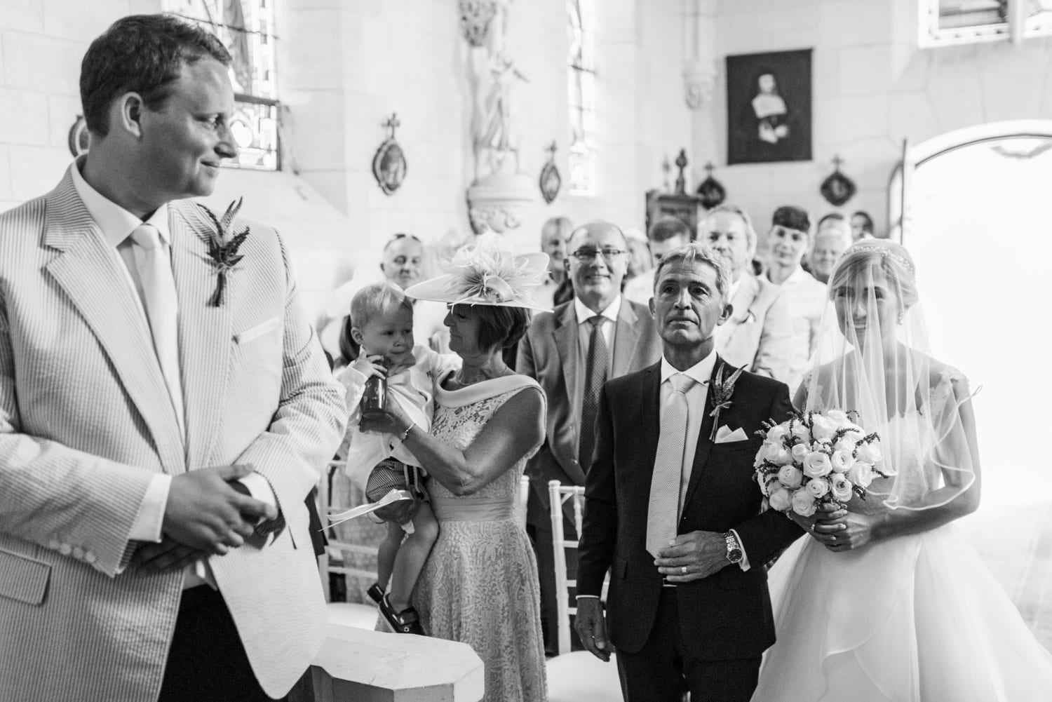 bride walking down the aisle at Chateau de Lacoste France