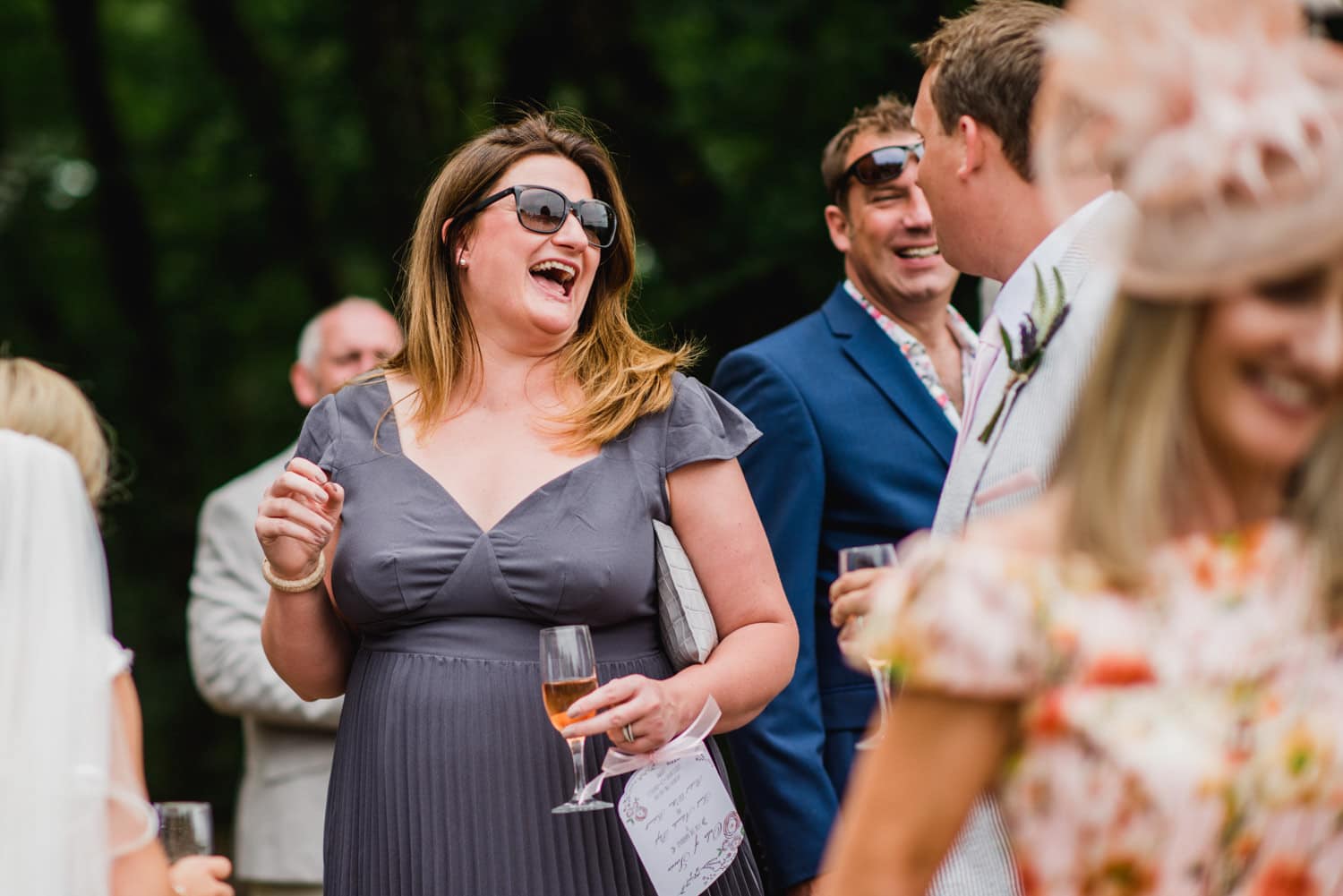 wedding reception guests laughing