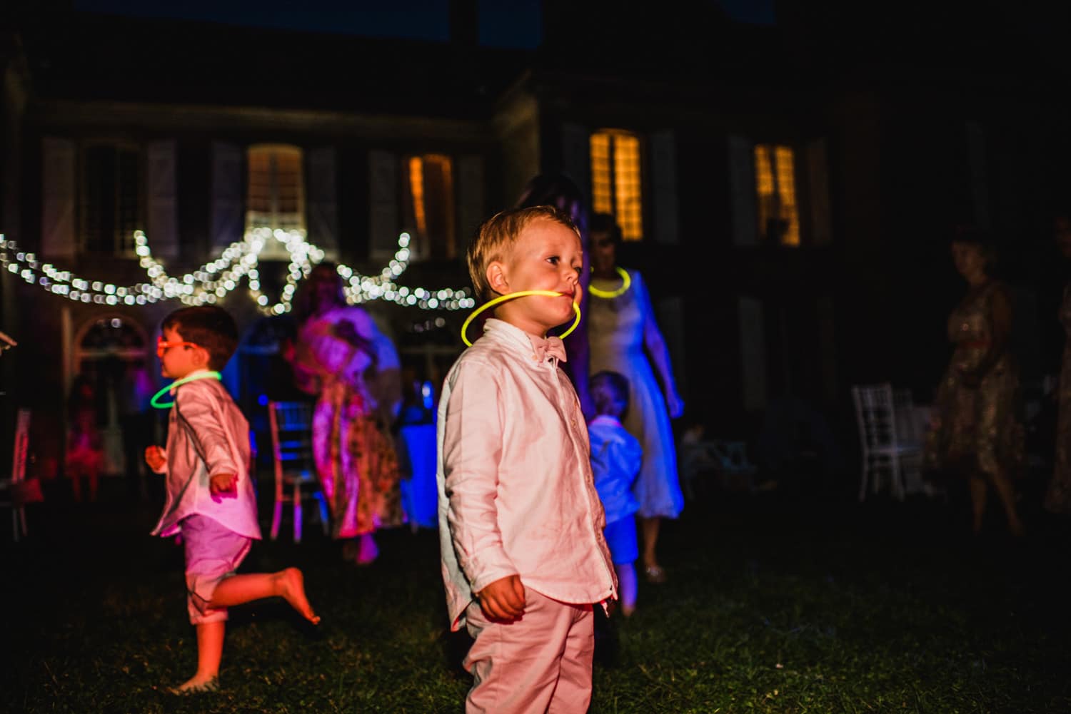 kids with glow sticks at wedding