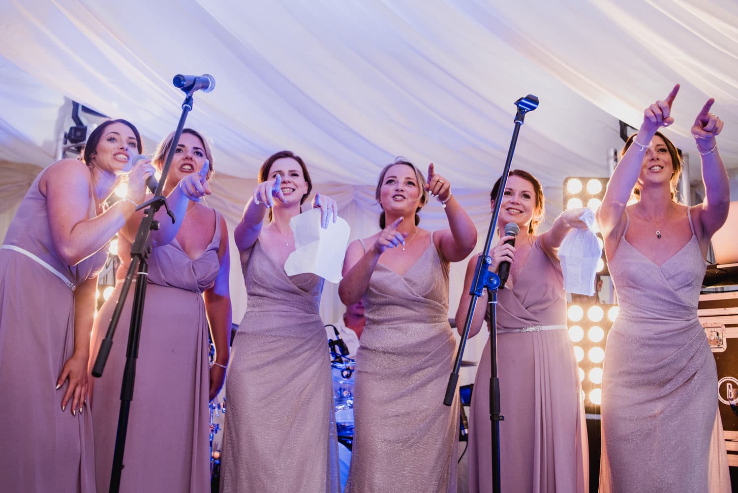 bridesmaids rapping at wedding