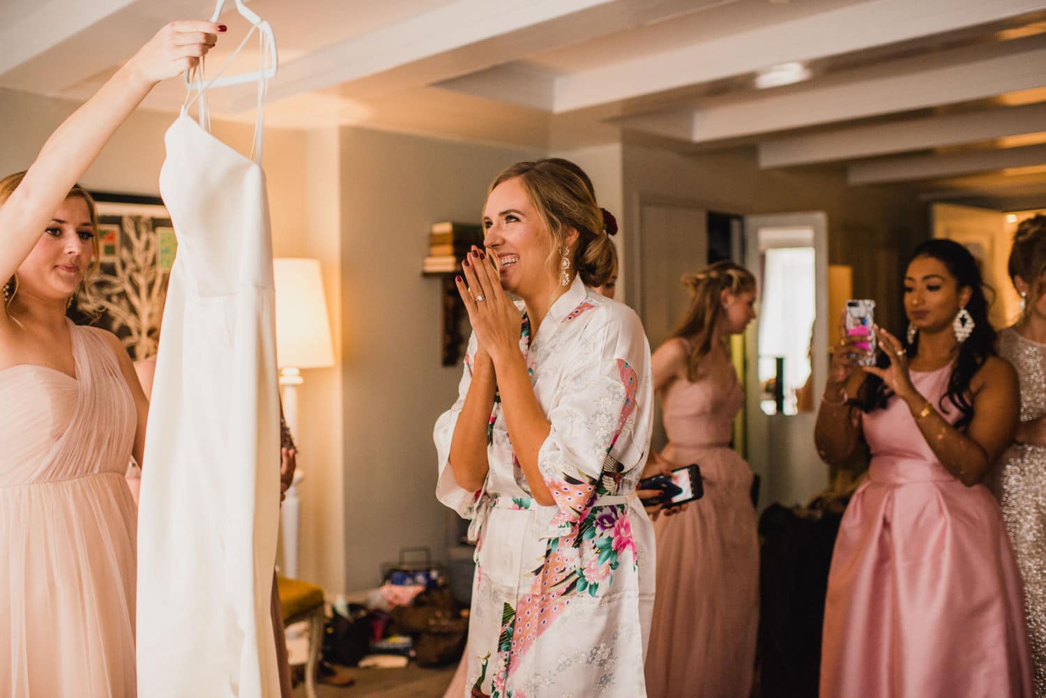 bride looking at her wedding dress