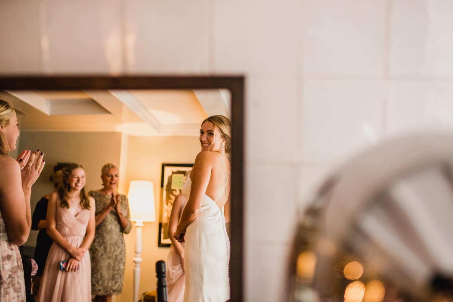 bride in reflection of mirror