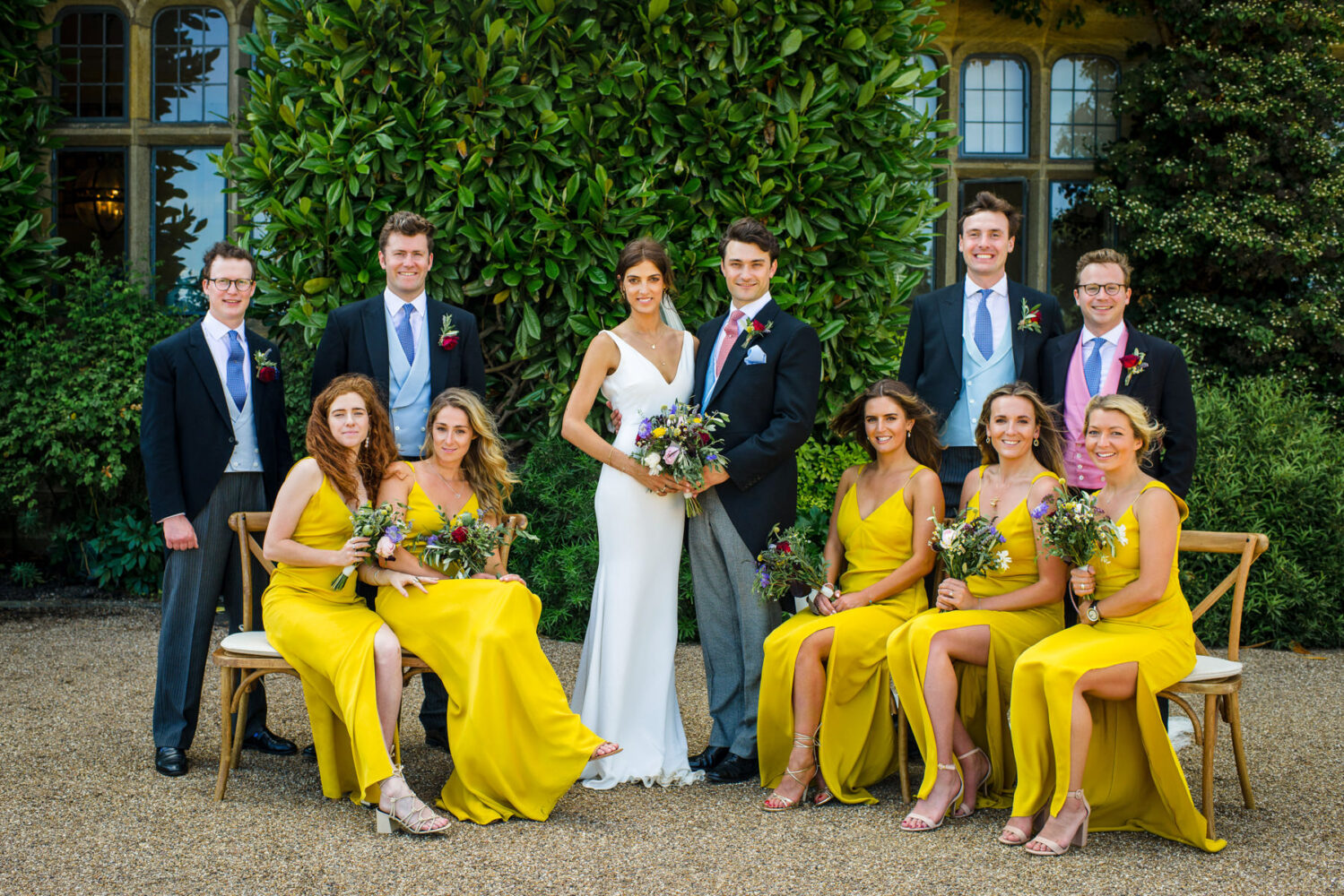 formal wedding photo, yellow bridesmaids dresses