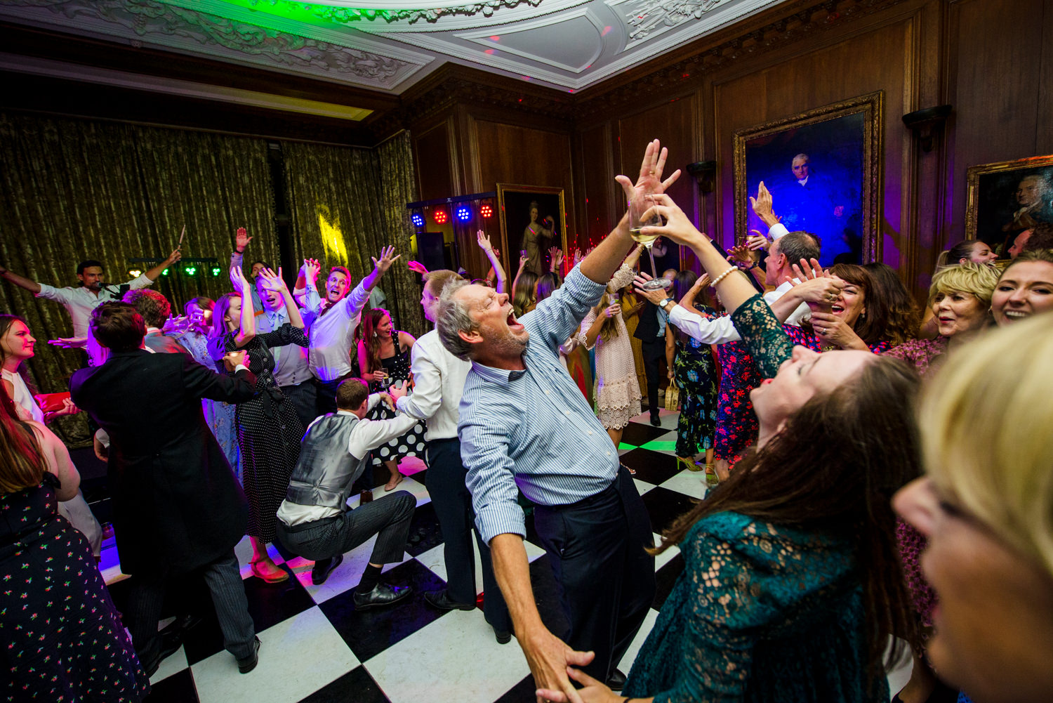 Wedding party dancing at Cowdray House