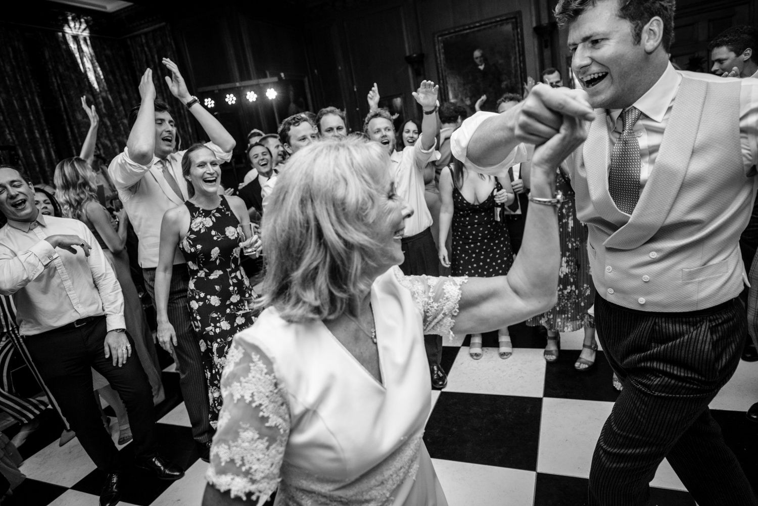 Wedding party dancing at Cowdray House