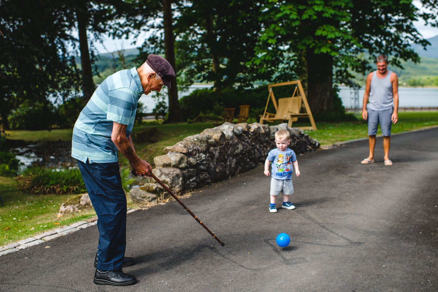 grandad playing golf with walking stick